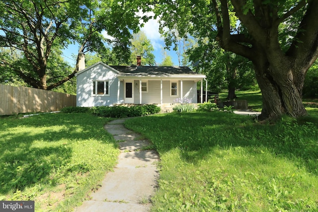 250 E Main St, Millheim, PA 16854 - view of front facade featuring a chimney and covered porch
