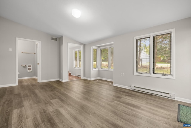 3720 Glenaire Dr, Charlottesville, VA 22901 - unfurnished room with a baseboard heating unit, wood finished floors, vaulted ceiling, baseboards, and heating unit