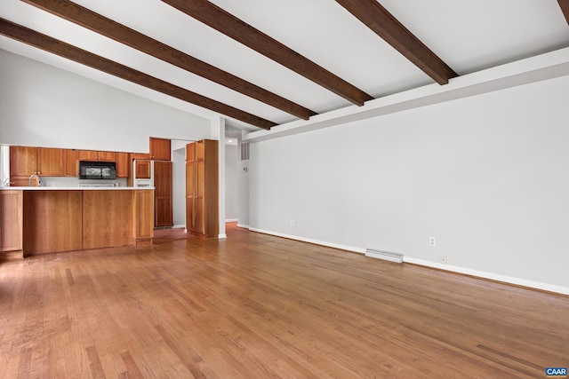 3720 Glenaire Dr, Charlottesville, VA 22901 - unfurnished living room featuring light wood-type flooring and baseboards