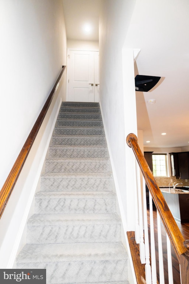 42624 Lisburn Chase Ter, Chantilly, VA 20152 - stairway featuring baseboards, recessed lighting, and carpet