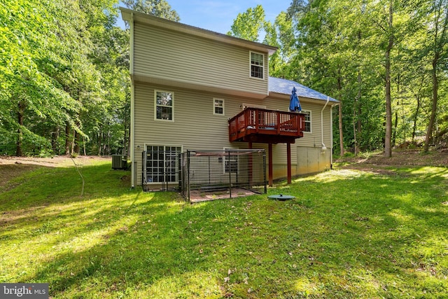 9380 Caucus Dr, King George, VA 22485 - rear view of house featuring a deck, a yard, and central AC