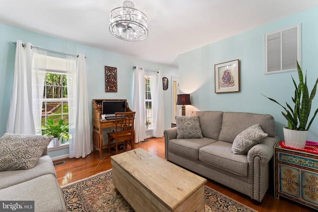 9380 Caucus Dr, King George, VA 22485 - living room with a chandelier and wood finished floors