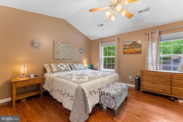 9380 Caucus Dr, King George, VA 22485 - bedroom featuring wood finished floors, vaulted ceiling, baseboards, and ceiling fan