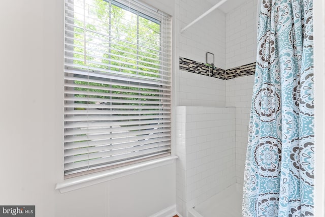9380 Caucus Dr, King George, VA 22485 - full bathroom with a stall shower and baseboards