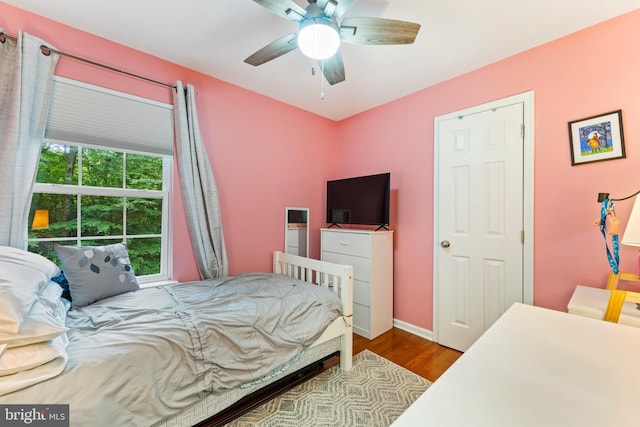 9380 Caucus Dr, King George, VA 22485 - bedroom featuring wood finished floors, ceiling fan, and baseboards