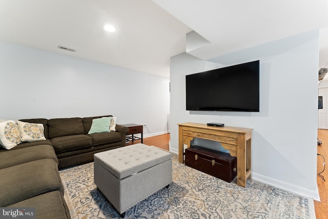 9380 Caucus Dr, King George, VA 22485 - living area with baseboards and wood finished floors