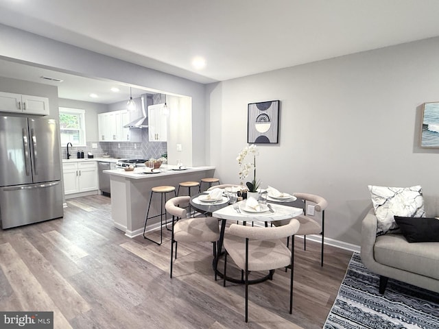 185 La Cascata, Clementon, NJ 08021 - dining space featuring light wood-type flooring, recessed lighting, and baseboards