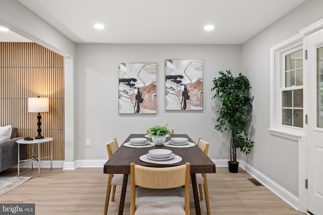 9813 Singleton Dr, Bethesda, MD 20817 - dining area with light wood-style flooring, baseboards, and recessed lighting
