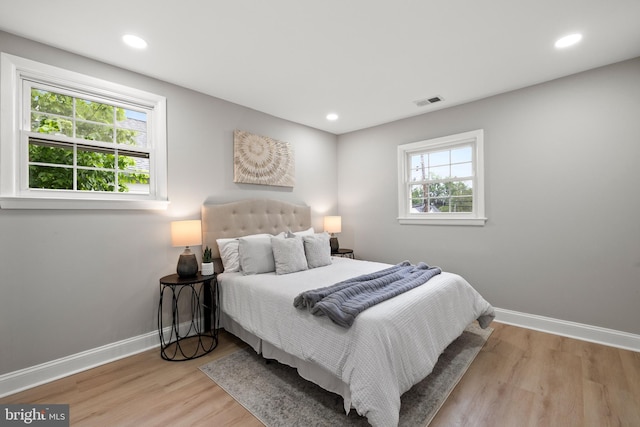 9813 Singleton Dr, Bethesda, MD 20817 - bedroom with baseboards, wood finished floors, and recessed lighting