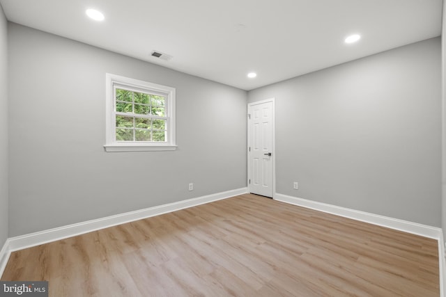 9813 Singleton Dr, Bethesda, MD 20817 - unfurnished room featuring baseboards, wood finished floors, and recessed lighting