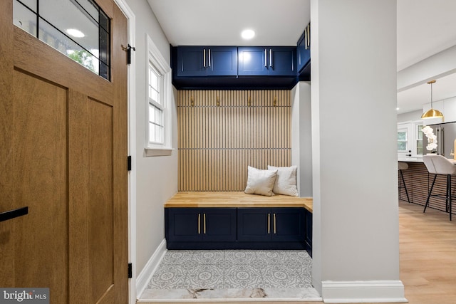 9813 Singleton Dr, Bethesda, MD 20817 - mudroom featuring baseboards, plenty of natural light, light wood-style floors, and recessed lighting