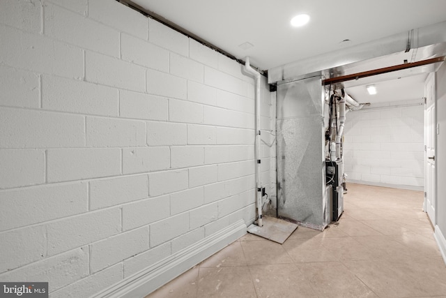 9813 Singleton Dr, Bethesda, MD 20817 - unfinished basement featuring concrete block wall and light tile patterned flooring