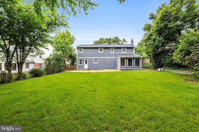 9813 Singleton Dr, Bethesda, MD 20817 - back of house with a chimney and a patio area