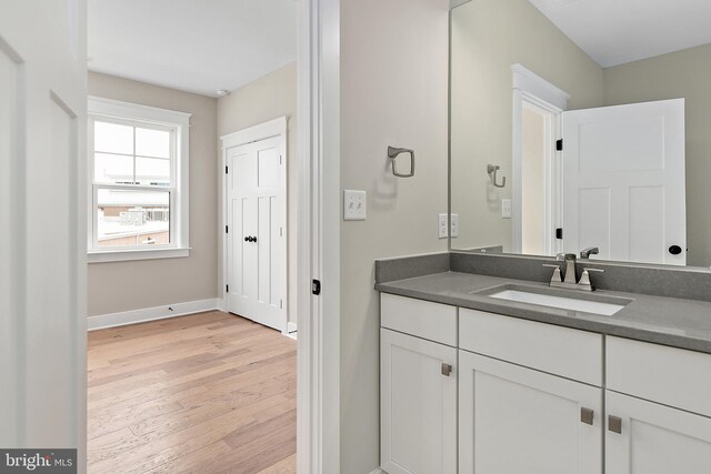 114 Jersey St, Dewey Beach, DE 19971 - bathroom featuring wood finished floors, vanity, and baseboards