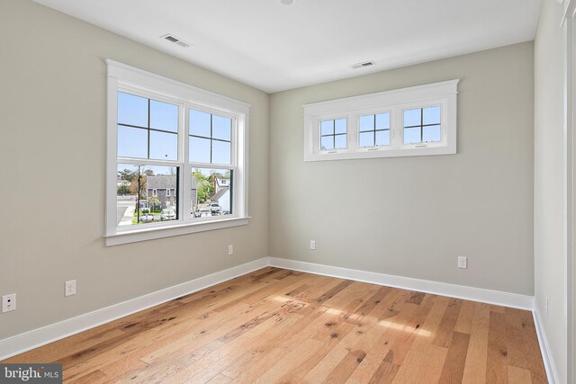 114 Jersey St, Dewey Beach, DE 19971 - empty room featuring baseboards and light wood-type flooring