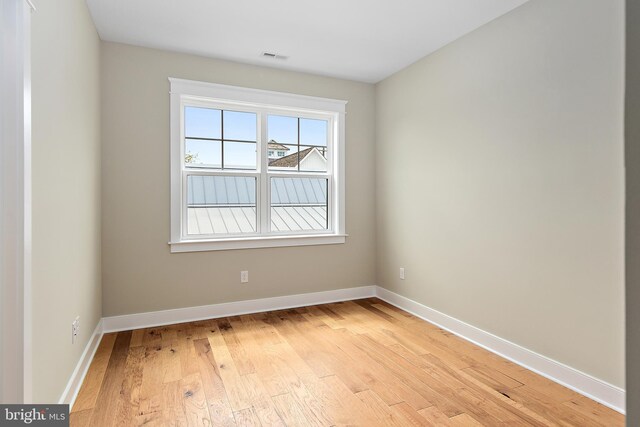 114 Jersey St, Dewey Beach, DE 19971 - unfurnished room with light wood-style flooring and baseboards