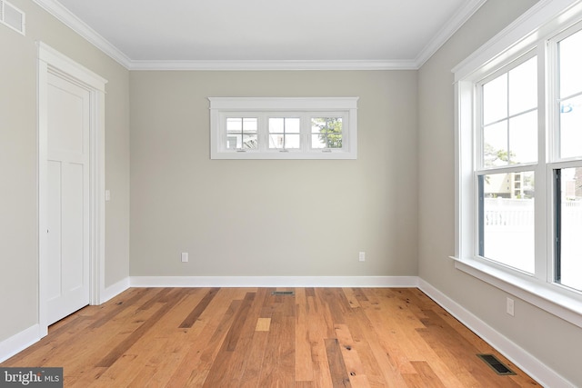114 Jersey St, Dewey Beach, DE 19971 - unfurnished room featuring light wood-type flooring, crown molding, and baseboards