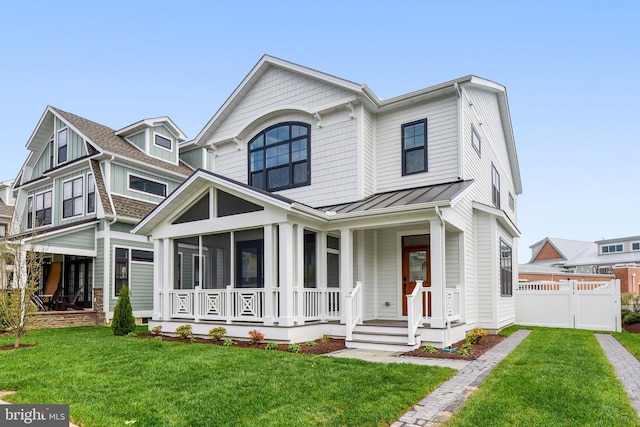 114 Jersey St, Dewey Beach, DE 19971 - view of front facade with a standing seam roof, metal roof, a sunroom, and a porch