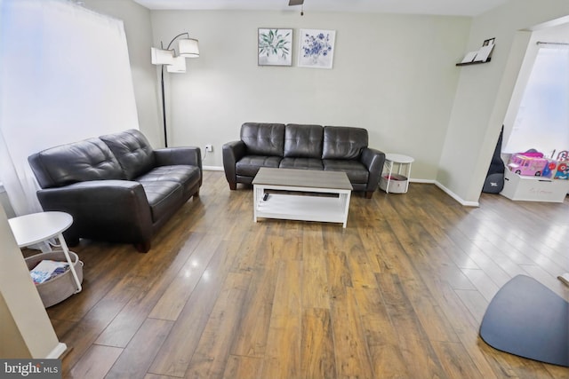 134 Cobblestone Dr, Gilbertsville, PA 19525 - living area with wood-type flooring, a ceiling fan, and baseboards