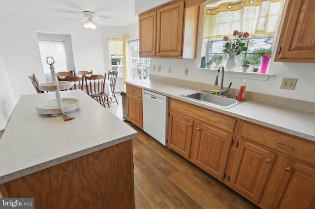 134 Cobblestone Dr, Gilbertsville, PA 19525 - kitchen with dishwasher, a sink, dark wood-style flooring, and light countertops