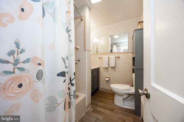951 Little Conestoga Rd, Glenmoore, PA 19343 - bathroom featuring tile walls, toilet, wood finished floors, shower / bath combo, and vanity