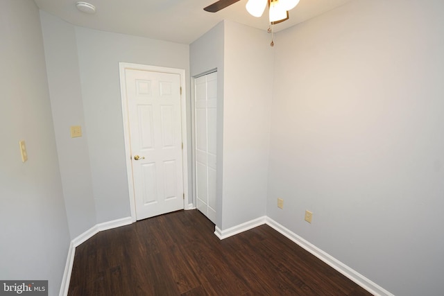 11699 Norris Twilley Rd, Sharptown, MD 21861 - spare room with dark wood-style flooring, a smoke detector, baseboards, and ceiling fan