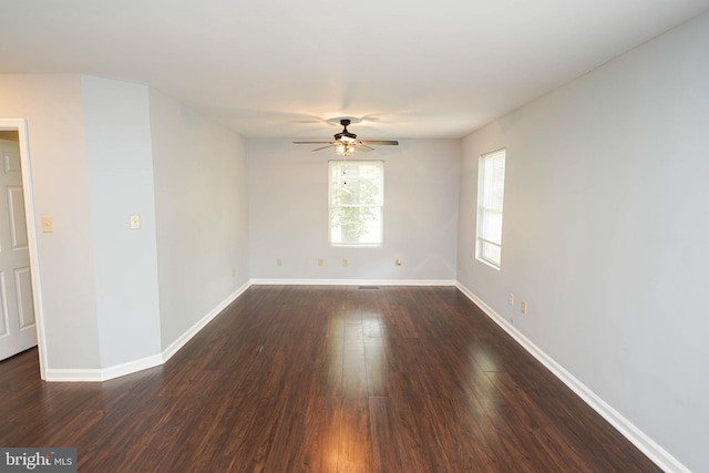 11699 Norris Twilley Rd, Sharptown, MD 21861 - empty room featuring ceiling fan, dark wood-type flooring, and baseboards