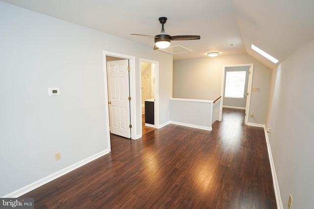 11699 Norris Twilley Rd, Sharptown, MD 21861 - spare room with dark wood finished floors, a ceiling fan, baseboards, and vaulted ceiling