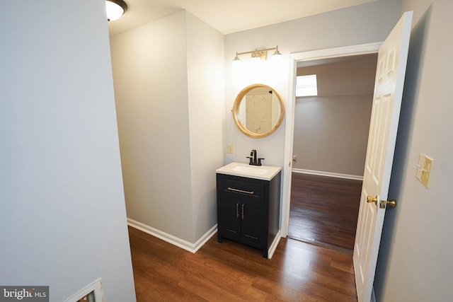 11699 Norris Twilley Rd, Sharptown, MD 21861 - bathroom featuring wood finished floors, vanity, and baseboards