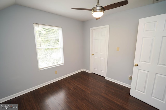 11699 Norris Twilley Rd, Sharptown, MD 21861 - unfurnished bedroom featuring dark wood-style flooring, baseboards, and a ceiling fan