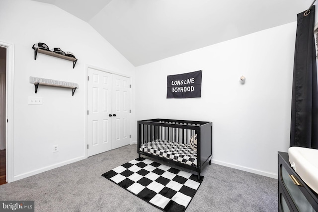 9177 Drawbridge Dr, Delmar, MD 21875 - carpeted bedroom featuring vaulted ceiling, a closet, and baseboards
