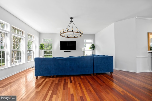 9177 Drawbridge Dr, Delmar, MD 21875 - living area with a chandelier, hardwood / wood-style floors, and baseboards