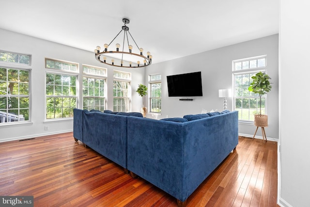 9177 Drawbridge Dr, Delmar, MD 21875 - living area featuring hardwood / wood-style flooring, a chandelier, and baseboards