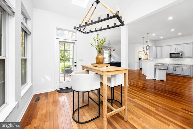 9177 Drawbridge Dr, Delmar, MD 21875 - dining area featuring light wood finished floors, recessed lighting, and baseboards
