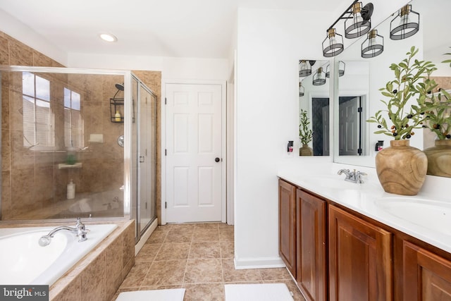 9177 Drawbridge Dr, Delmar, MD 21875 - bathroom with a garden tub, a shower stall, double vanity, and tile patterned floors