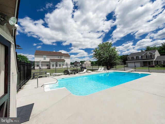 9177 Drawbridge Dr, Delmar, MD 21875 - view of swimming pool featuring a patio area and a residential view
