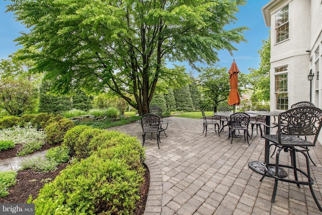 view of patio with outdoor dining area