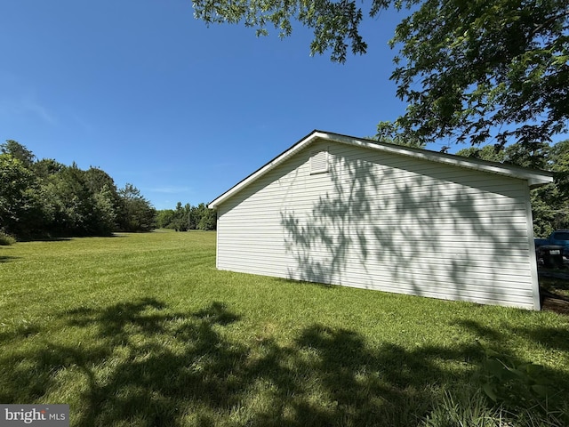 10491 Oak Tree Dr, King George, VA 22485 - view of home's exterior featuring a lawn