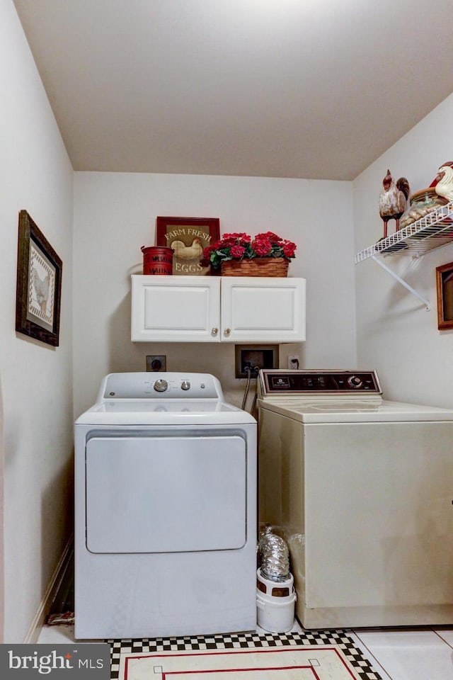 10 Devonshire Sq, Mechanicsburg, PA 17050 - laundry area with cabinet space and washing machine and dryer
