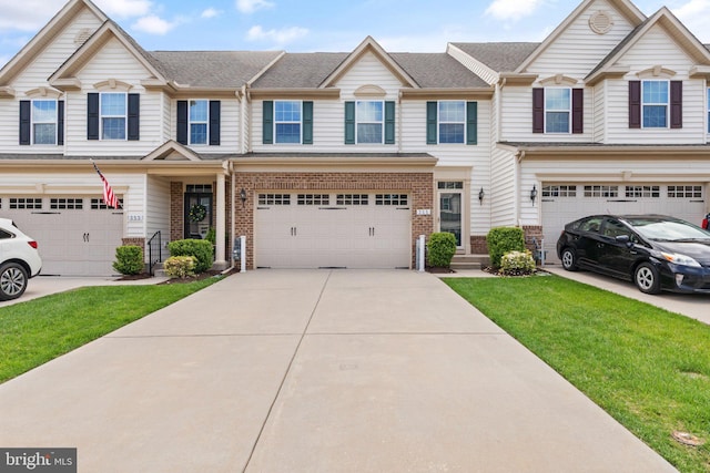 355 Tufton Cir, Fallston, MD 21047 - multi unit property with brick siding, an attached garage, driveway, and a front yard