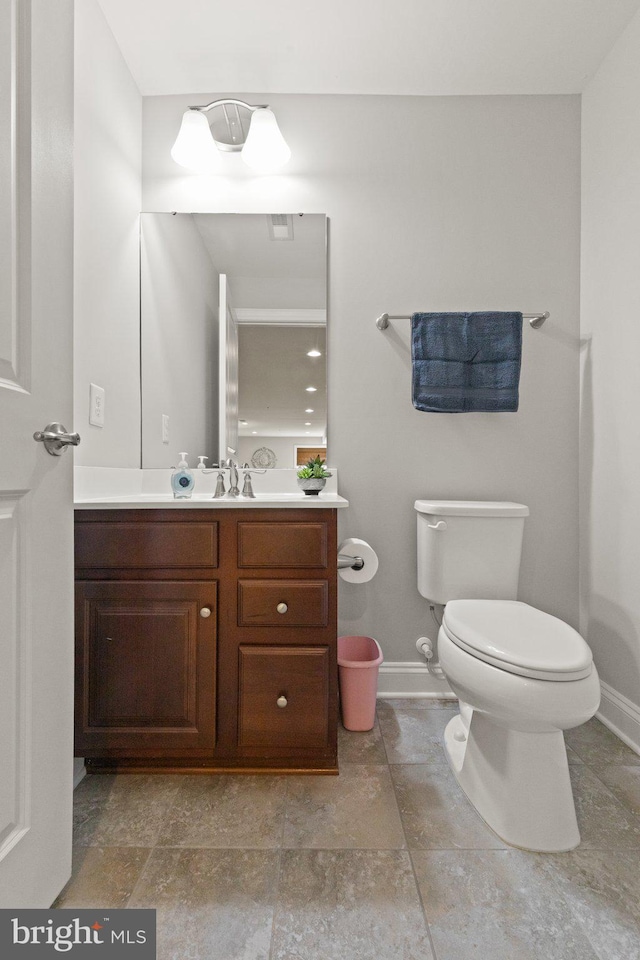 355 Tufton Cir, Fallston, MD 21047 - bathroom featuring toilet, baseboards, and vanity