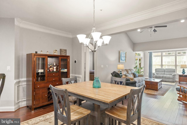 355 Tufton Cir, Fallston, MD 21047 - dining space featuring lofted ceiling, dark wood finished floors, a chandelier, ceiling fan, and crown molding
