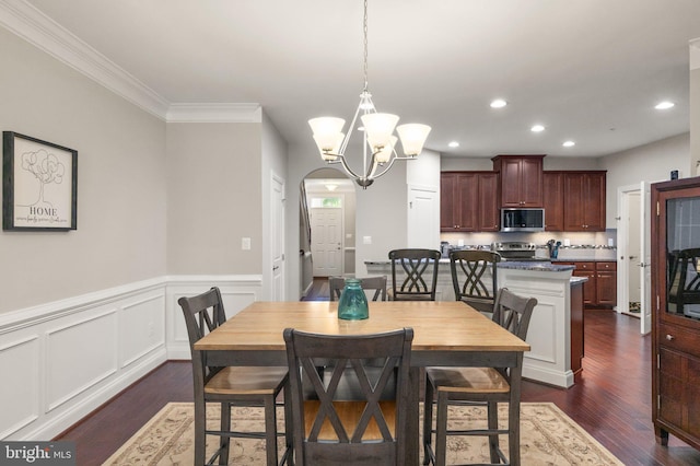 355 Tufton Cir, Fallston, MD 21047 - dining space with dark wood-style flooring, recessed lighting, a wainscoted wall, crown molding, and a chandelier