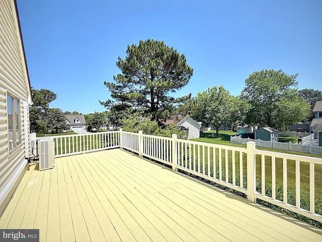 957 Terrapin St Unit 2, Bethany Beach, DE 19930 - deck featuring cooling unit and a yard
