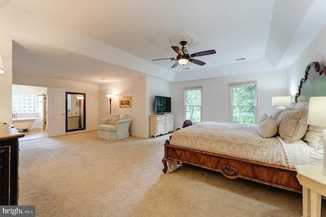1296 Newkirk Ct, Vienna, VA 22182 - bedroom with a raised ceiling, light carpet, and ceiling fan