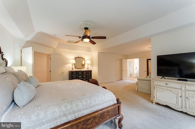 1296 Newkirk Ct, Vienna, VA 22182 - bedroom with a raised ceiling, light carpet, and a ceiling fan