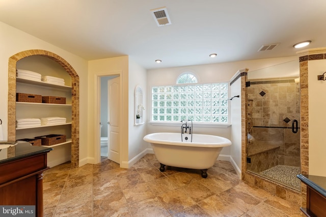 1296 Newkirk Ct, Vienna, VA 22182 - bathroom with a stall shower, a soaking tub, and vanity