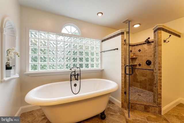 1296 Newkirk Ct, Vienna, VA 22182 - bathroom with a freestanding tub, healthy amount of natural light, and a shower stall