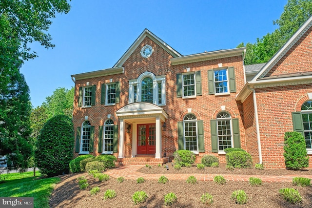 1296 Newkirk Ct, Vienna, VA 22182 - colonial house with brick siding and french doors