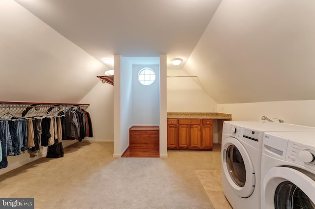 1296 Newkirk Ct, Vienna, VA 22182 - laundry area with washing machine and clothes dryer, light colored carpet, and cabinet space